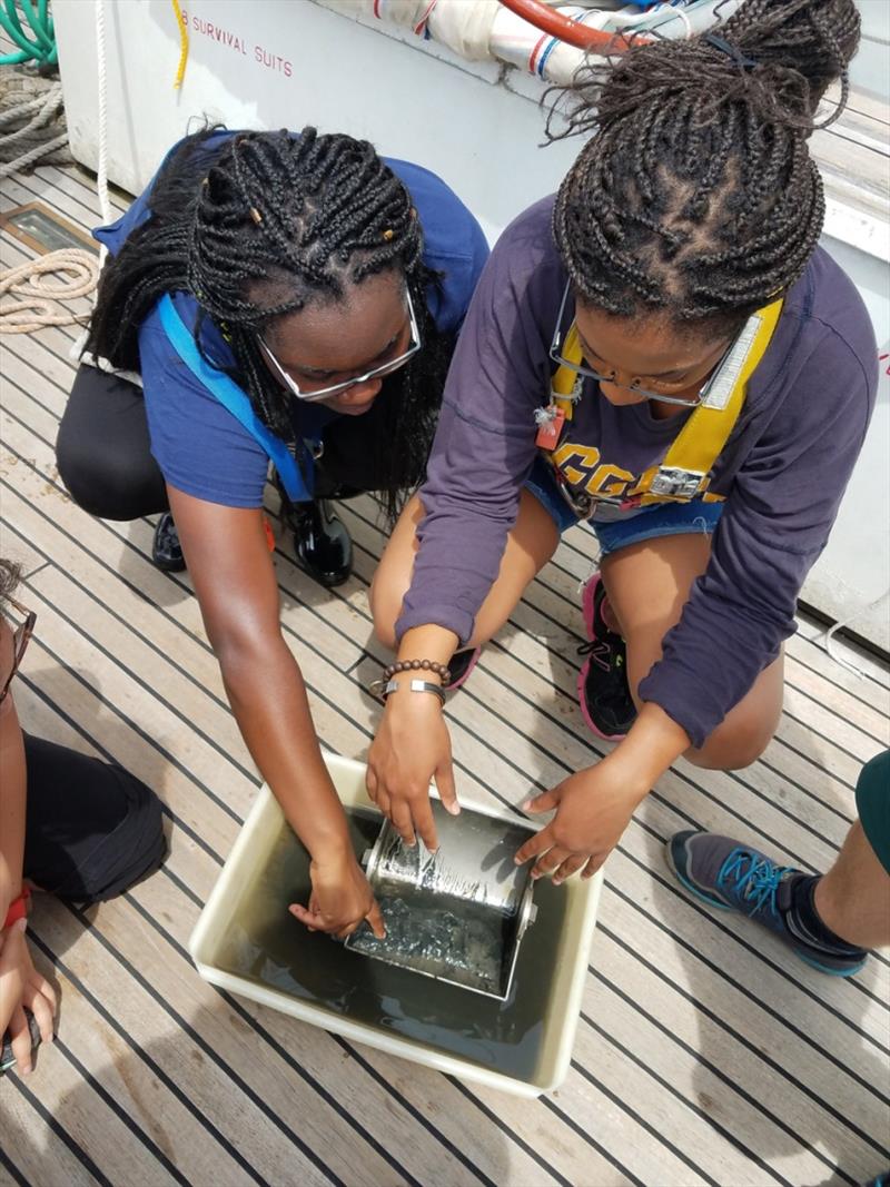 On the Corwith Cramer cruise, PEP students learn oceanographic research techniques, such as collecting bottom sediment samples photo copyright NOAA Fisheries taken at 