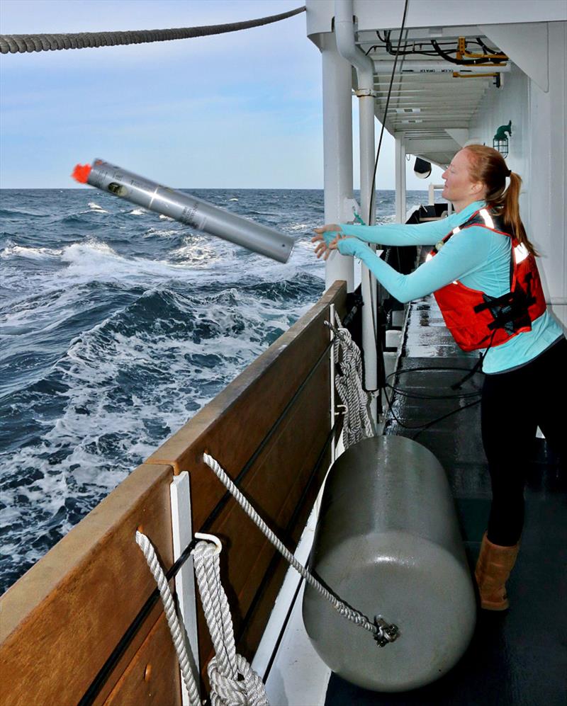 NOAA Fisheries scientist Jessica Crance deploys a sonobuoy to acoustically monitor for North Pacific right whale calls photo copyright NOAA Fisheries taken at 