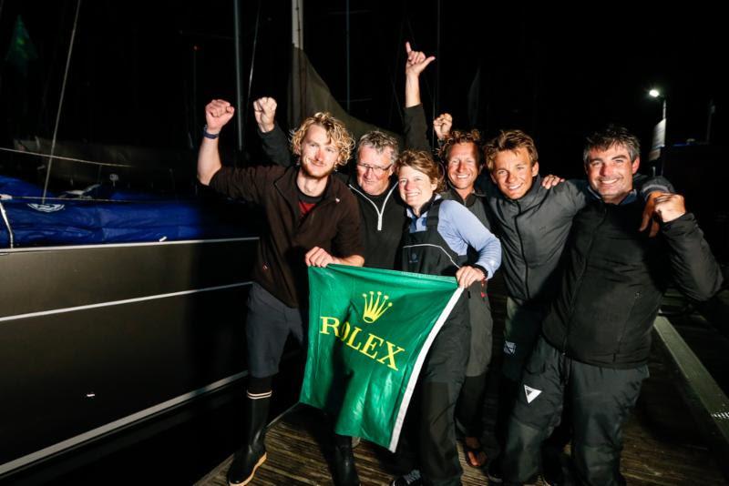 The crew of Foggy Dew celebrate the end of a successful race. Noel Racine's fourth class win out of eight Fastnets. - 2019 Rolex Fastnet Race - photo © Paul Wyeth / www.pwpictures.com