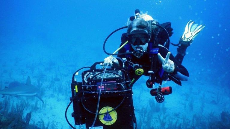WHOI scientist Colleen Hansel scuba-dives to corals in Cuba's Gardens of the Queen reefs with the first model of DISCO, which stands for DIver-operated Submersible Chemiluminescent sensor photo copyright Ashlee Lillis, Woods Hole Oceanographic Institution taken at 