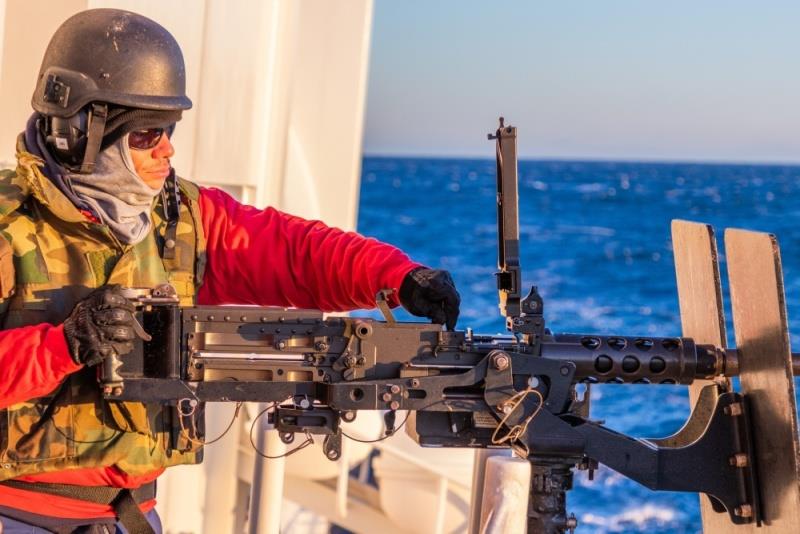Petty Officer 2nd Class Alvarado prepares to fire one of cutter Escanaba's M2 .50 Caliber Machine Guns during a gunnery exercise in early December. Coast Guard Cutter Escanaba returned to Boston Thursday after a 70-day patrol in the North Atlantic Ocean photo copyright Coast Guard / Firemen Trevor Hammack taken at 