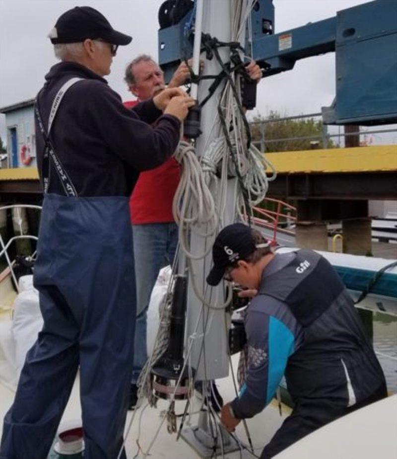 Putting the mast back on Galene photo copyright Bluewater Cruising Association taken at 