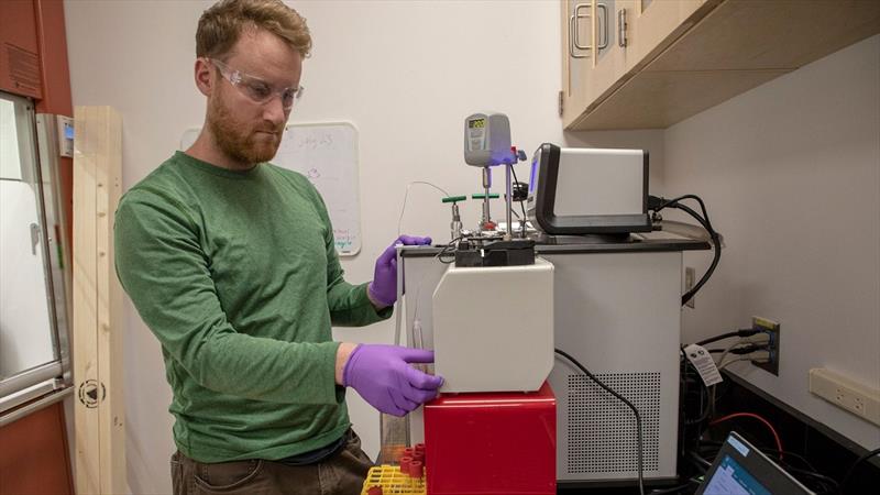 Marine chemist Collin Ward working in his lab. - photo © Jayne Doucette, © Woods Hole Oceanographic Institution