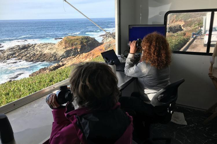 Researchers from NOAA Fisheries' Southwest Fisheries Science Center count gray whales as they migrate south past Granite Canyon on the Central California Coast in January 2020. The count informed a new estimate of the gray whale population photo copyright NOAA Fisheries taken at 