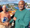 Sailing Secretary Andy Townend (right) presenting Nick Speller with his Trophy at the Sully Sailing Club Annual Regatta © Nigel Vick