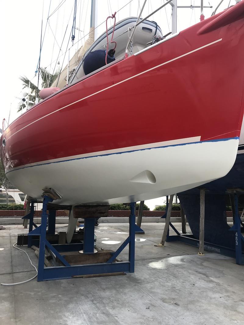 First coat of antifoul on bottom (blue masking tape to be removed after second coat) photo copyright SV Red Roo taken at 