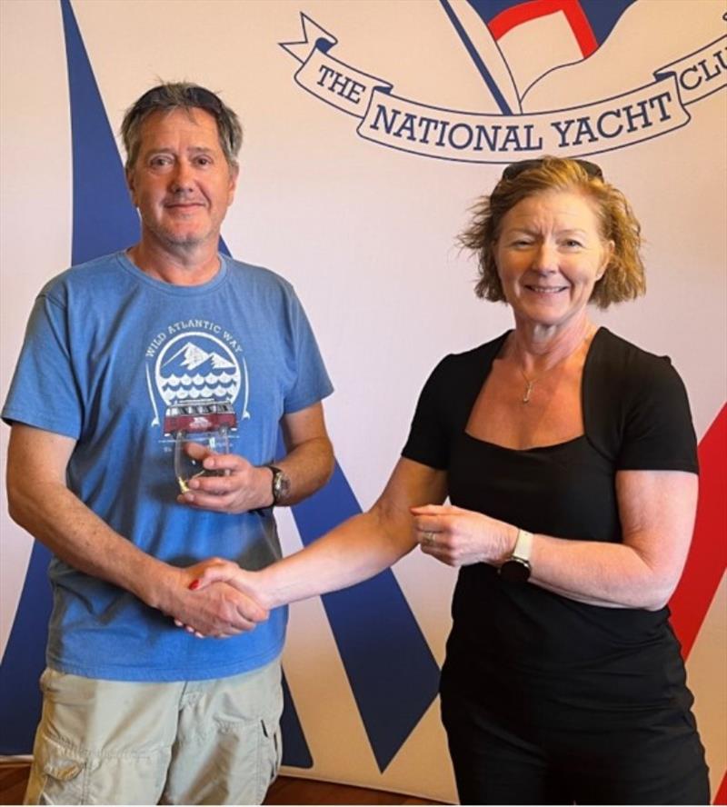 Bretzel Bakery MD Dymphna O'Brien presents Robert Howe (Monkstown Bay SC) with the prize for 1st Master, Irish RS Aero Nationals 2023 photo copyright Stephen Oram taken at National Yacht Club, Ireland