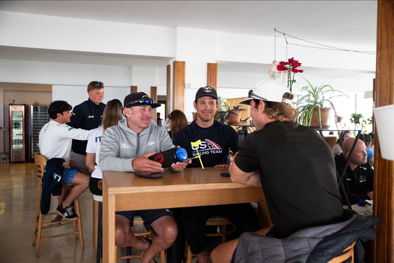 USST ILCA 7 Coach Ryan Minth meets with USST ILCA 7 Athlete Ford McCann and his brother, Marshall McCann photo copyright US Sailing Team taken at Real Club Náutico de Palma