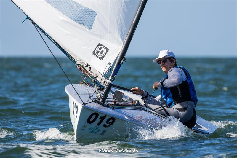 2024 Tan Lines OK Dinghy World Championship - First Veteran - Nick Craig, GBR photo copyright Robert Deaves taken at Royal Queensland Yacht Squadron and featuring the OK class