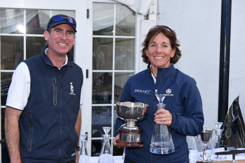 Louise Morton picks up her Quarter Ton winnings for Bullet from the RORC's Tim Thubron on day 3 of the RORC Vice Admiral's Cup 2019 - photo © Rick Tomlinson / www.rick-tomlinson.com
