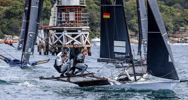 Germany's Black Knight team prepare to set the spinnaker after rounding the weather mark - 18ft Skiff Australian Championship photo copyright SailMedia taken at Australian 18 Footers League and featuring the 18ft Skiff class
