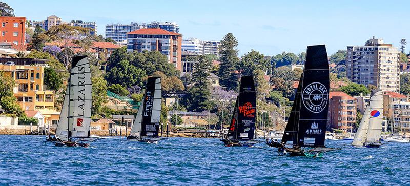 Lazarus heads a hot fleet photo copyright SailMedia taken at Australian 18 Footers League and featuring the 18ft Skiff class