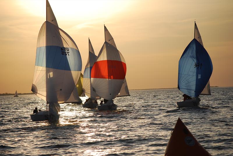 Sonars carrying kites in the setting sun - photo © Image courtesy of Rochester Yacht Club