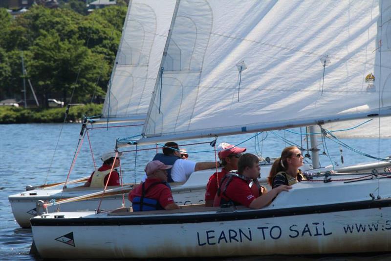 Racecourse action at a Special Olympics Regatta photo copyright Community Boating Inc. taken at Boston Yacht Club and featuring the Sonar class