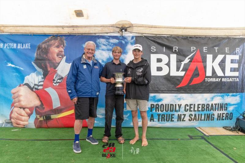 William Mason receives the Sir Peter Blake Memorial Trophy from renowned broadcaster Peter Montgomery (left) and last year's recipient Sean Kensington photo copyright LiveSailDie taken at Torbay Sailing Club and featuring the Starling class
