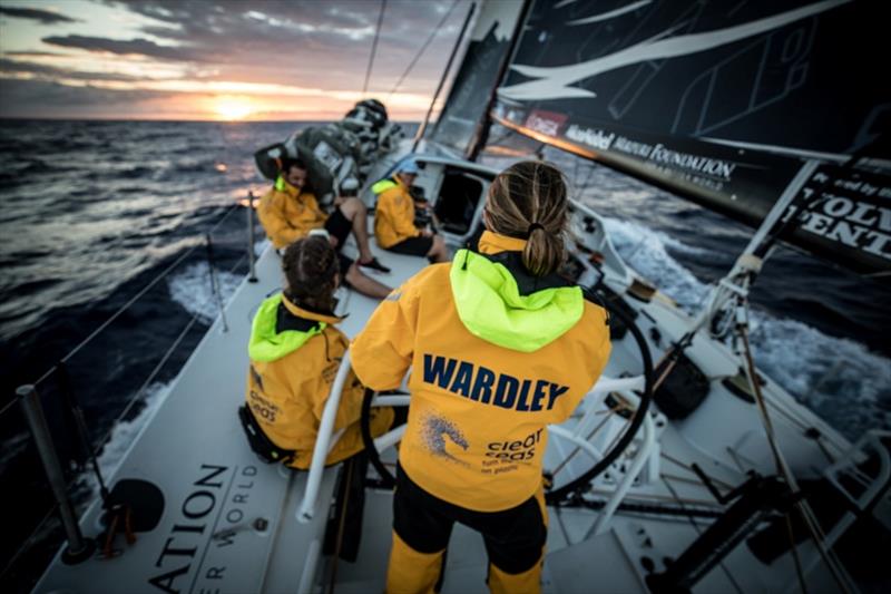Volvo Ocean Race Leg 8 from Itajai to Newport, day 3 on board Turn the Tide on Plastic.. Liz Wardley on the helm during sunrise photo copyright James Blake / Volvo Ocean Race taken at  and featuring the Volvo One-Design class