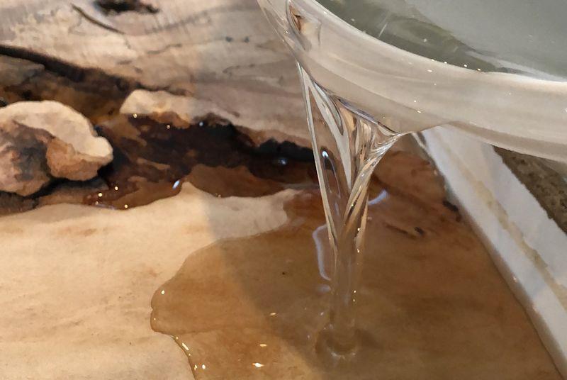Pouring Entropy Resins to make a river table - photo © Rooso Designs