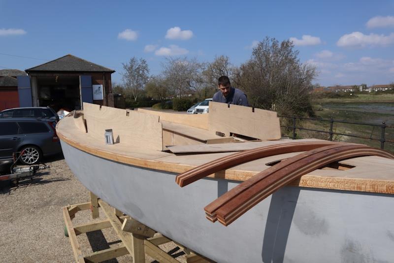 Out in the yard, the part-completed Secret 20 kit boat donated by Practical Boat Owner magazine is taking shape - photo © Wessex Resins & Adhesives