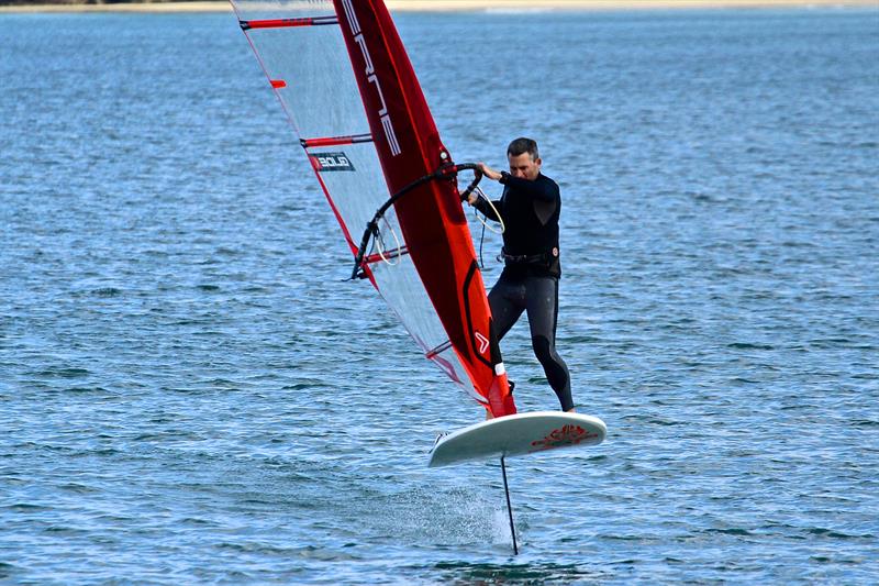 Olympic rep JP Tobin doing a foiling gybe in light winds  - Takapuna Beach - October 2018 - photo © Richard Gladwell