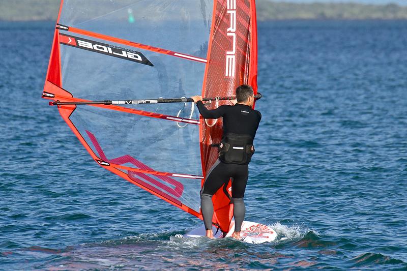Windfoil at displacement speed - soon afterward the board was lifted onto the foil with a couple of quick arm pumps  - October 2018 - photo © Richard Gladwell