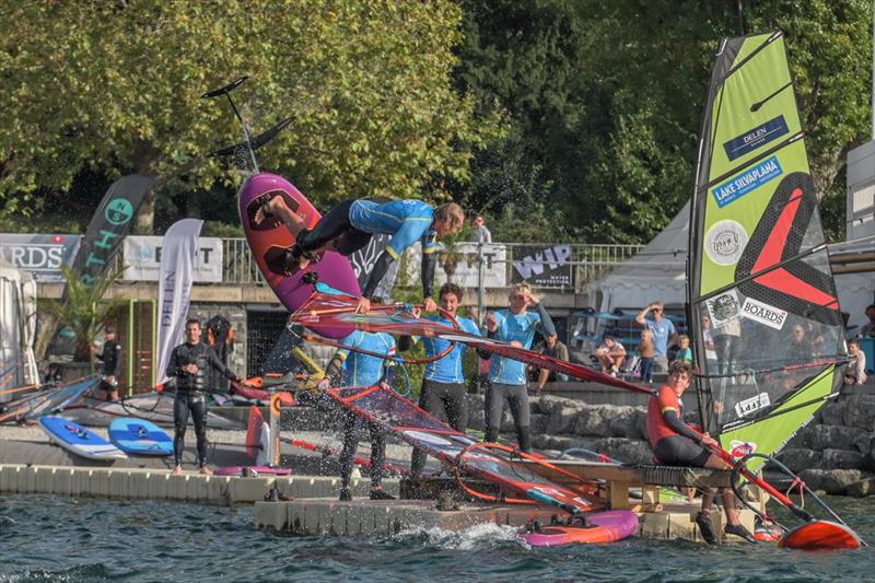 Yentel Caers (JP/NeilPryde) getting some fitting reactions from his opponents at the 2023 EFPT Geneva photo copyright PROtography Official taken at  and featuring the Windsurfing class
